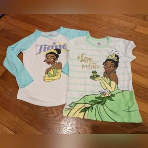 Two Disney Princess Tiana shirts. Girls size M (7/8)